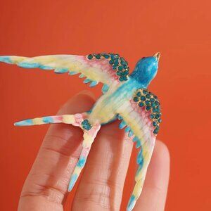 Blue swallow brooch